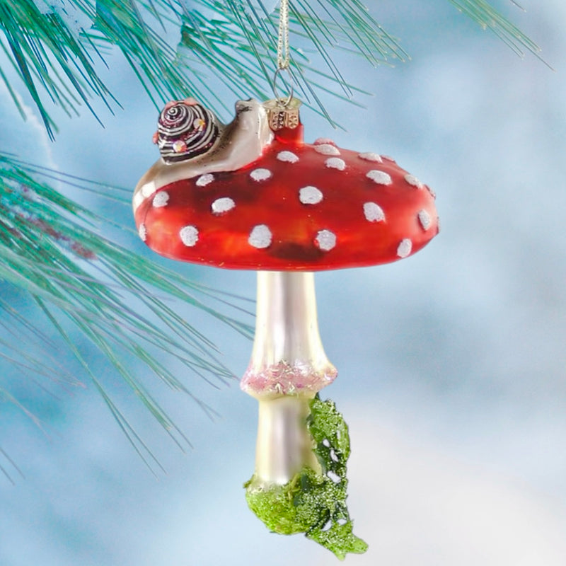 glass mushroom with snail ornament by Cody foster
